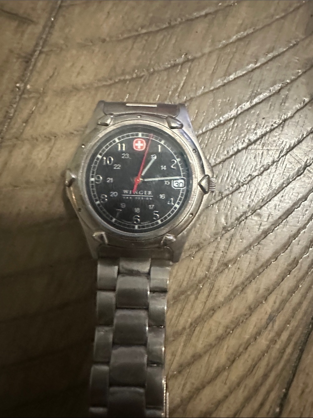 Wenger Stainless Steel Watch with Black Dial and Red Accent